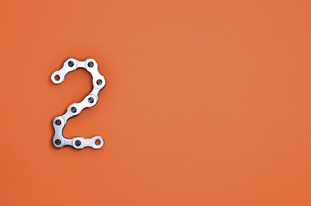 The number 2 on a bright orange background